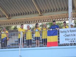 Romanian athletes watching students' performances